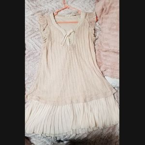 Ruffle sleeve cream laceup dress